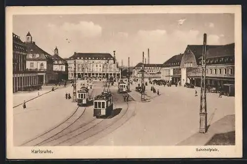 AK Karlsruhe, Bahnhofplatz mit Strassenbahn