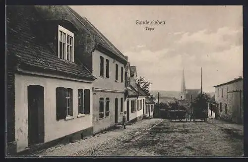 AK Sandersleben, Teps-Strasse mit Blick zur Kirche