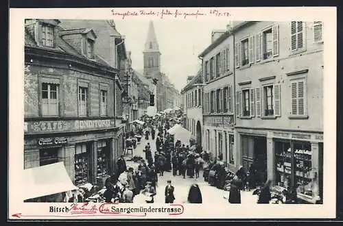 AK Bitsch, Blick in die Herrenstrasse mit Geschäften und Passanten