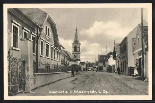 AK Winzendorf a. d. Schneebergbahn, Strassenansicht mit Kirche