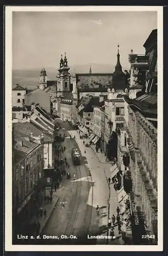 AK Linz a. d. Donau /Ob.-Oe., Landstrasse mit Strassenbahn