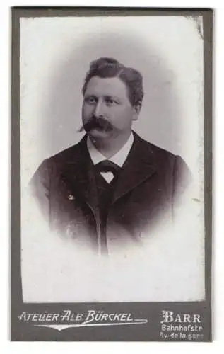 Fotografie Alb. Bürckel, Barr, Bahnhofstr., Portrait eines Herren mit markantem Schnurrbart