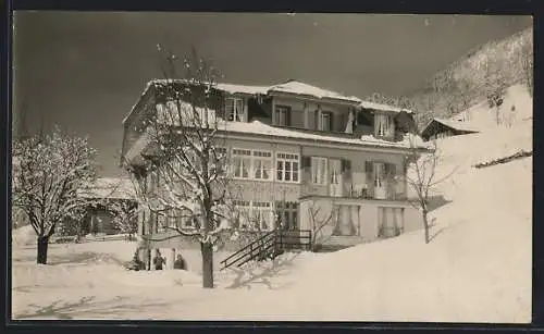 Foto-AK Wengen, Pension Villa Schweizerheim im Schnee