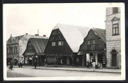 AK Lomnice n. Pop., Ortspartie mit Geschäften