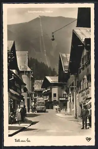 AK Zell a. See, Strassenpartie mit Passanten