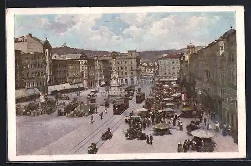 AK Linz a. Donau, Strassenbahnen auf einem Platz mit Cafes