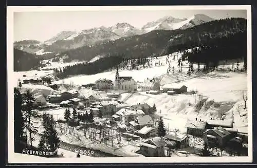 AK Fieberbrunn, Ortsansicht im Winter