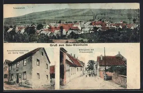 AK Gau-Weinheim, Kolonialwarenhandlung von Georg Geiss, Strasse Mittelgasse mit Friedensbaum, Teilansicht