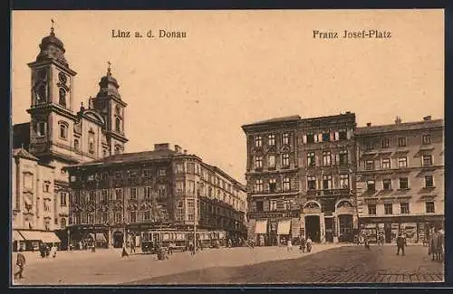 AK Linz a. d. Donau, Franz Josef-Platz mit Geschäften und Strassenbahn