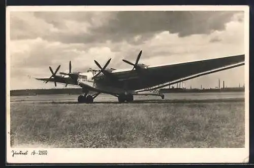 AK Flugzeug Junkers D-2500 auf einem Feld