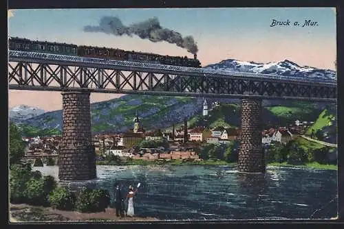 AK Bruck a. Mur, Ortsansicht mit Eisenbahn auf der Brücke