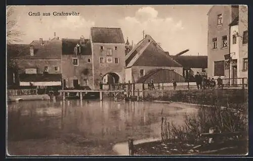 AK Grafenwöhr, Ortspartie am Wasser mit Tordurchgang