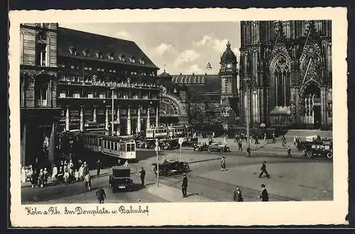 AK Köln am Rhein, Strassenbahn am Domplatz und Bahnhof