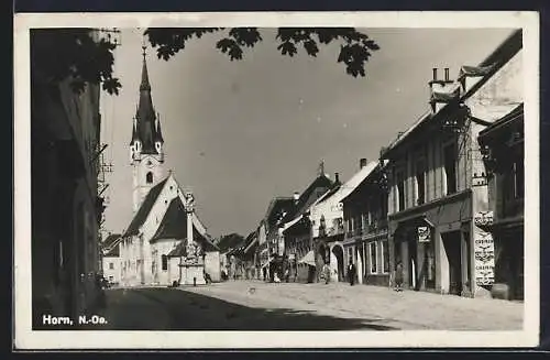 AK Horn, Strassenpartie mit Geschäften an der Kirche