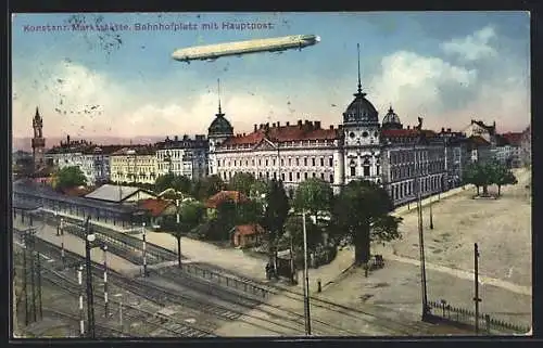 AK Konstanz, Zeppelin über dem Bahnhofplatz mit Hauptpost