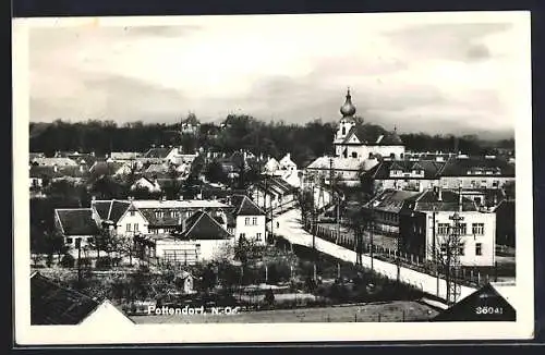 AK Pottendorf /N.-Oe., Teilansicht mit Kirche und Strassenpartie