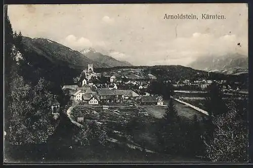 AK Arnoldstein /Kärnten, Ortsansicht gegen die Berge