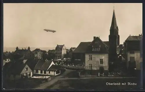 AK Helgoland, Zeppelin über der Insel, Oberland mit Kirche