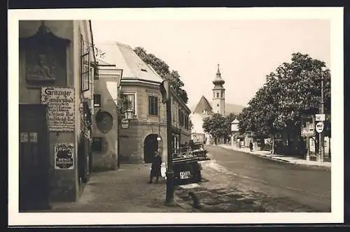 AK Wien-Grinzing, Strassenpartie mit Blick gegen die Kirche