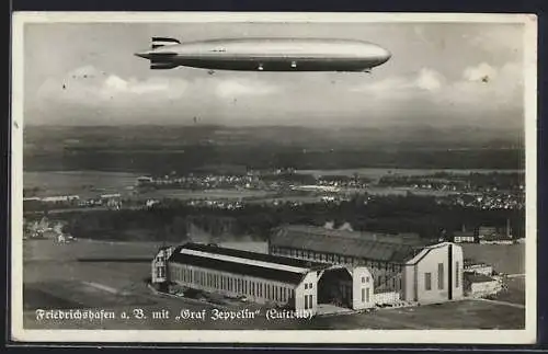 AK Friedrichshafen a. B., LZ 127 Graf Zeppelin über der Werkshalle