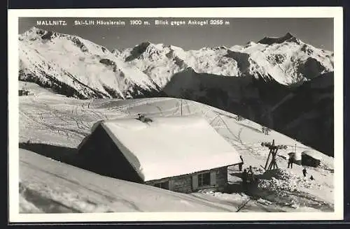 AK Mallnitz, Skilift Häusleralm mit Blick gegen Ankogel im Winter