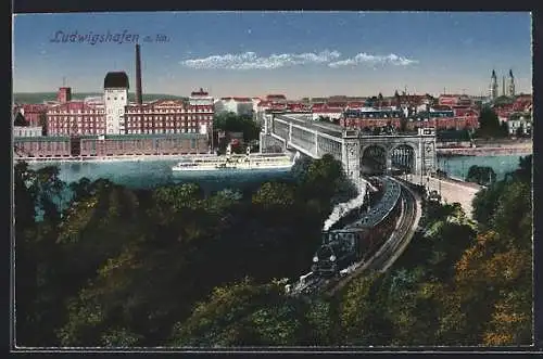 AK Ludwigshafen a. Rh., Ortsansicht mit Rheinbrücke und Bahn aus der Vogelschau