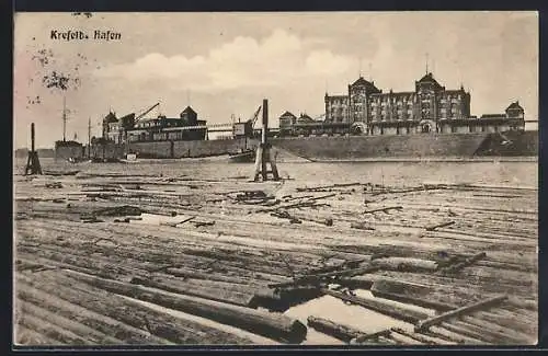 AK Krefeld, Geflösste Stämme im Hafen