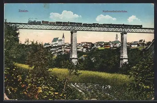 AK Znaim /Znojmo, Befahrene Eisenbahnbrücke mit Blick auf die Ortschaft