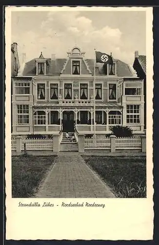 AK Norderney, Hotel Strandvilla Lührs mit flagge, Inh. Gerh. Visser