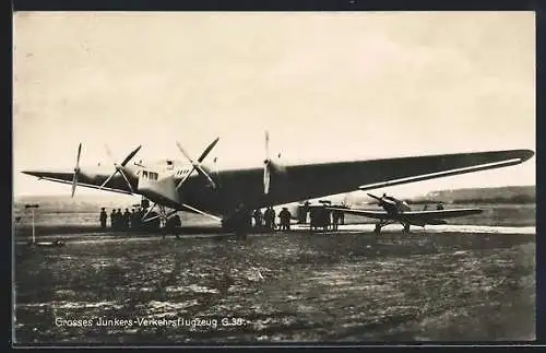 Foto-AK Grosses Junkers-Verkehrsflugzeug G38 am Boden, Passagiere beim Einsteigen