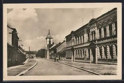 AK Nechanice, Strassenpartie mit Blick zum Glockenturm