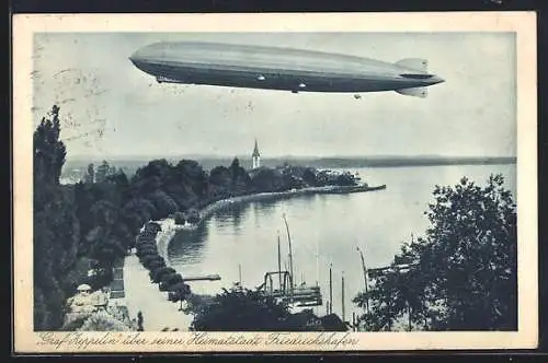 AK Friedrichshafen, Luftschiff Graf Zeppelin LZ 127 über der Stadt