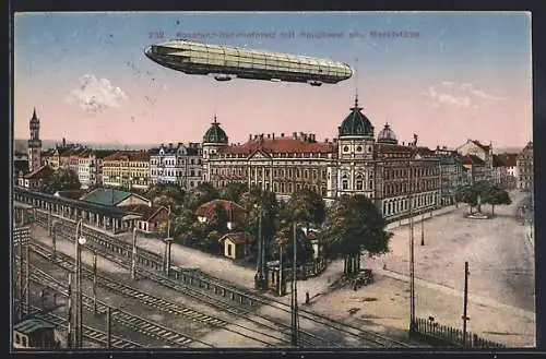 AK Konstanz-Bahnhofsplatz mit Hauptpost und Markstätte, Zeppelin