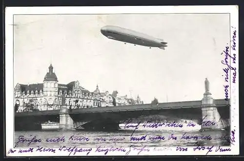 AK Konstanz, Zeppelin LZ 127 Graf Zeppelin über der Stadt