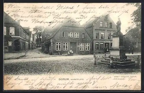 AK Dorum, Marktplatz mit Geschäftshaus Martin Fock, Denkmal und Strasse