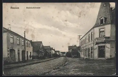 AK Bassum, Bahnhofstrasse mit Schluenbergs Gasthof