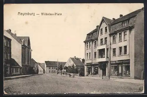 AK Meyenburg / Prignitz, Wilhelmsplatz mit Buchhandlung von Wilhelm Sternberg