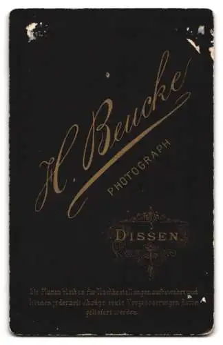 Fotografie H. Beucke, Dissen, Porträt einer Frau mit Schleife