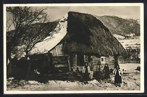 AK Ruská Stará Chýse, Bäuerinnen vor einem Holzhaus im Winter