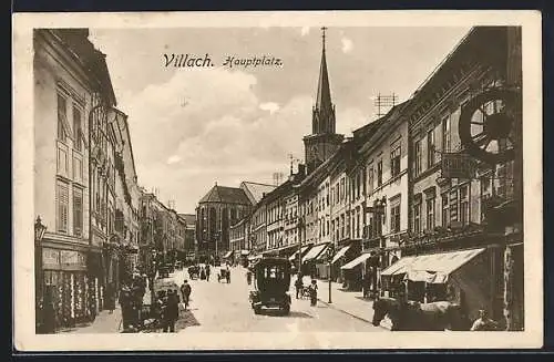 AK Villach, Hauptplatz mit Geschäften, Blick in Richtung Kirche