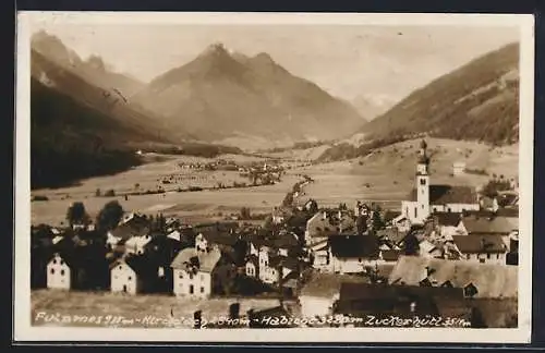 AK Fulpmes, Ortspartie mit Blick auf Berggipfel