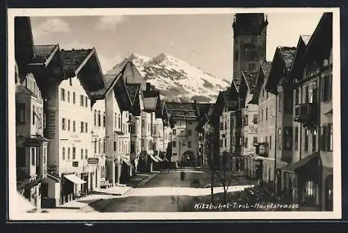 AK Kitzbühel, Strassenpartie mit Blick auf die Berge