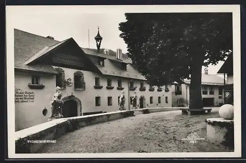 AK Pichl a. d. Enns, Strassenpartie mit Statuen