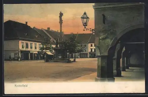 AK Knittelfeld, Strassenpartie mit Denkmal