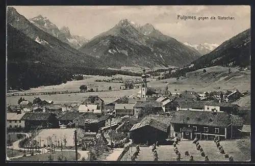 AK Fulpmes, Ortsansicht aus der Vogelschau mit Blick auf das umliegende Gebirge