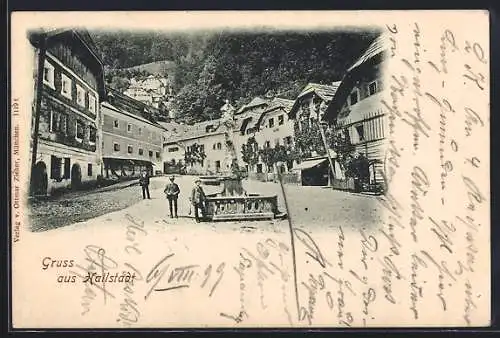 AK Hallstatt, Ortspartie mit Knaben am Brunnen