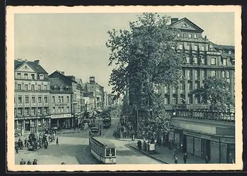 AK Saarbrücken, Strasse mit Strassenbahnen