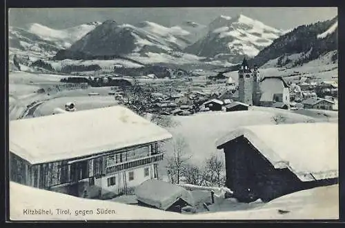 AK Kitzbühel, Ortsansicht im Winter gegen Süden