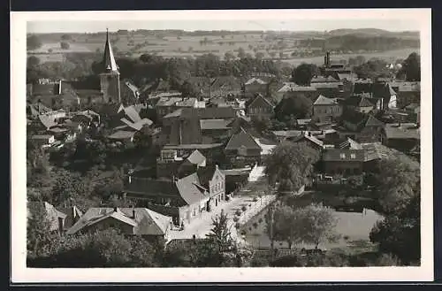 AK Lütjenburg /Ostholstein, Teilansicht mit Kirche und Strassenpartie