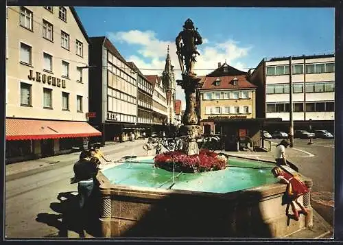 AK Reutlingen, Brunnen und Geschäft J. Kocher